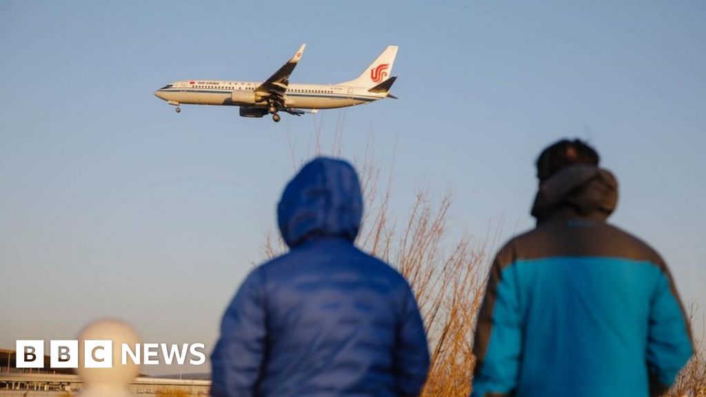 Covid in China: People rush to book travel as borders finally reopen - BBC News